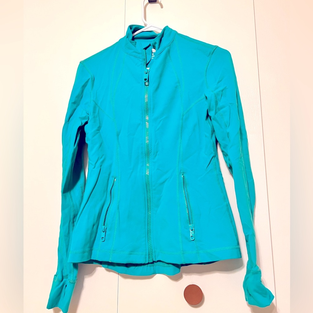 Kirkland brand zip-up, workout gear.